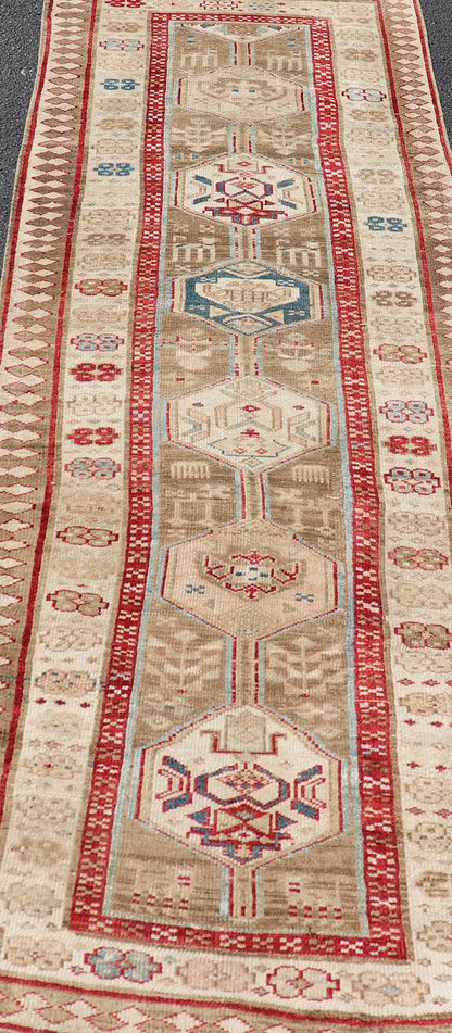 Persian Hand Knotted Antique Serab Runner in Tribal Design With Medallions. Antique Persian Tribal Serab runner, Keivan Woven Arts / rug/ ZIR - 59 - KV - 05, origin/iran 1900 Measures: 3'0 x 8'10 This antique Serab carpet from 1900s Persia features a ... - Keivan Woven ArtsZIR - 59 - KV - 05 - 15018