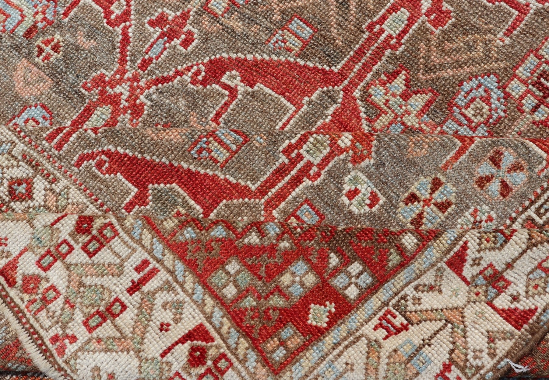 Kurdish Antique Gallery Runner with Tribal Design in Light Green, Tan and Red Antique Kurdish runner antique with tribal geometric medallions in soft green, brown, red, cream and tans. rug ZIR - 62 - KV - 14 - 15, Keivan Woven Arts / country of origin /... - Keivan Woven ArtsZIR - 62 - KV - 14 - 15 - 15036