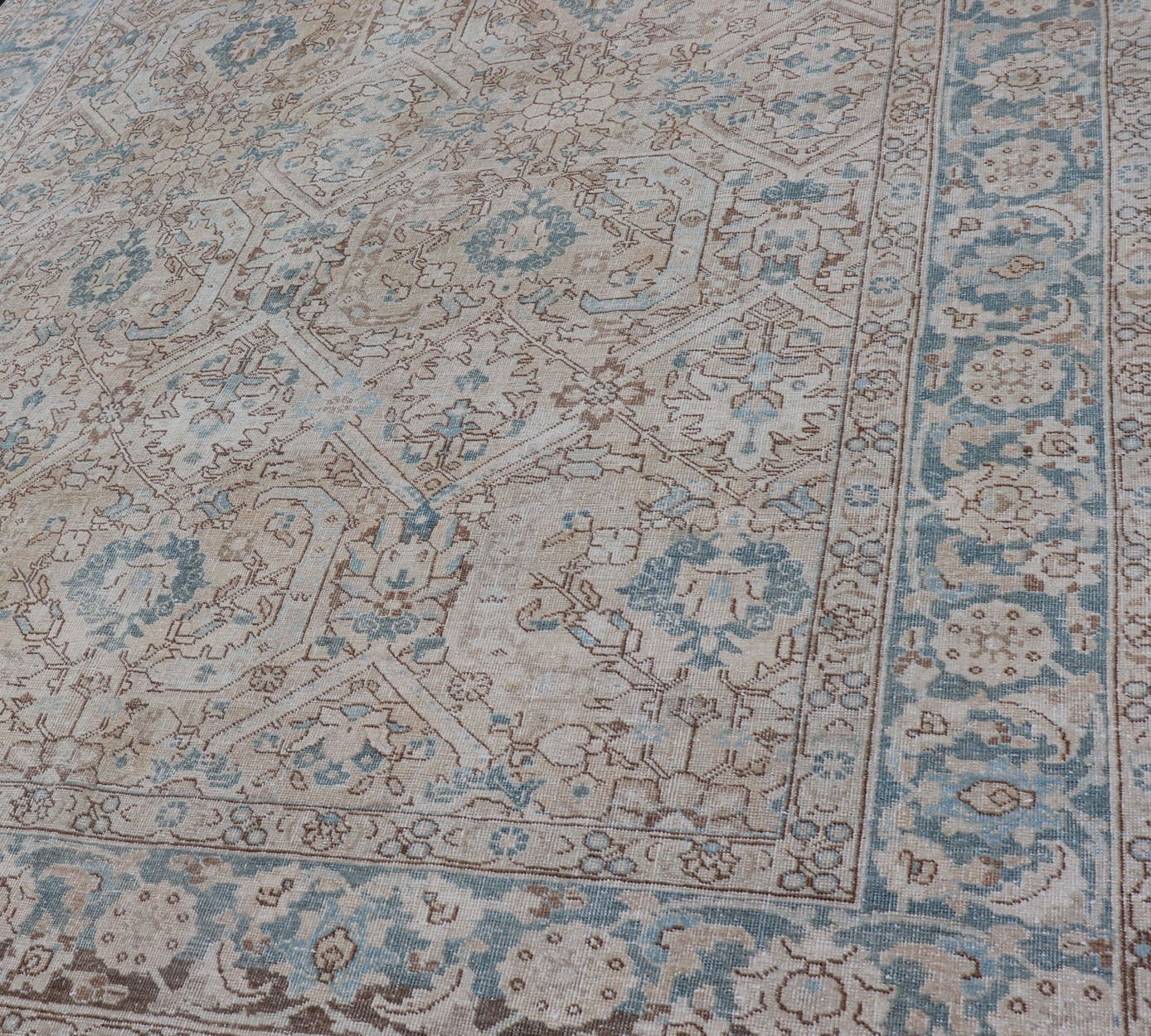Blue, brown and Tan Persian Antique Tabriz Rug with All - Over Geometric Design. Tan background Persian Tabriz rug with geometric design, rug ZIR - 65 - KV - 11, country of origin / type: Iran / Tabriz, circa 1930. This magnificent early 20th centur... - Keivan Woven ArtsZIR - 65 - KV - 11 - 15054