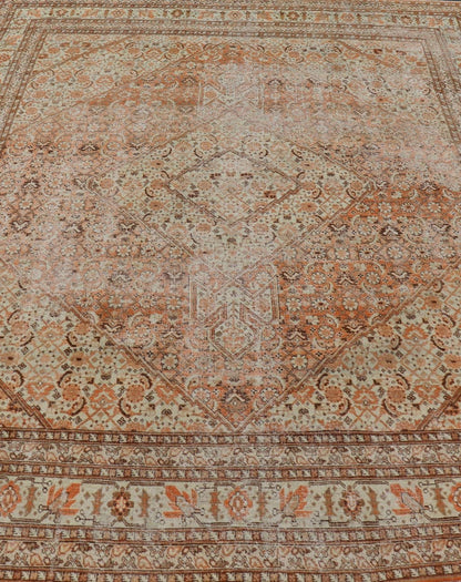 Antique Persian Tabriz with All - Over Medallion Design in Orange and Browns This antique Persian Tabriz rug features an all - over, sub - geometric floral design rendered in off white, orange and brown tones. A complementary, multi - tiered border enco... - Keivan Woven ArtsZIR - 66 - KV - 12 - 15060