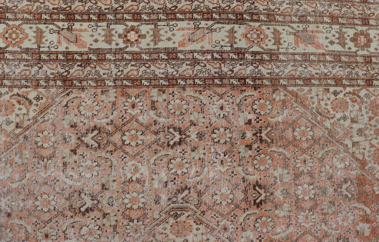 Antique Persian Tabriz with All - Over Medallion Design in Orange and Browns This antique Persian Tabriz rug features an all - over, sub - geometric floral design rendered in off white, orange and brown tones. A complementary, multi - tiered border enco... - Keivan Woven ArtsZIR - 66 - KV - 12 - 15060Rug