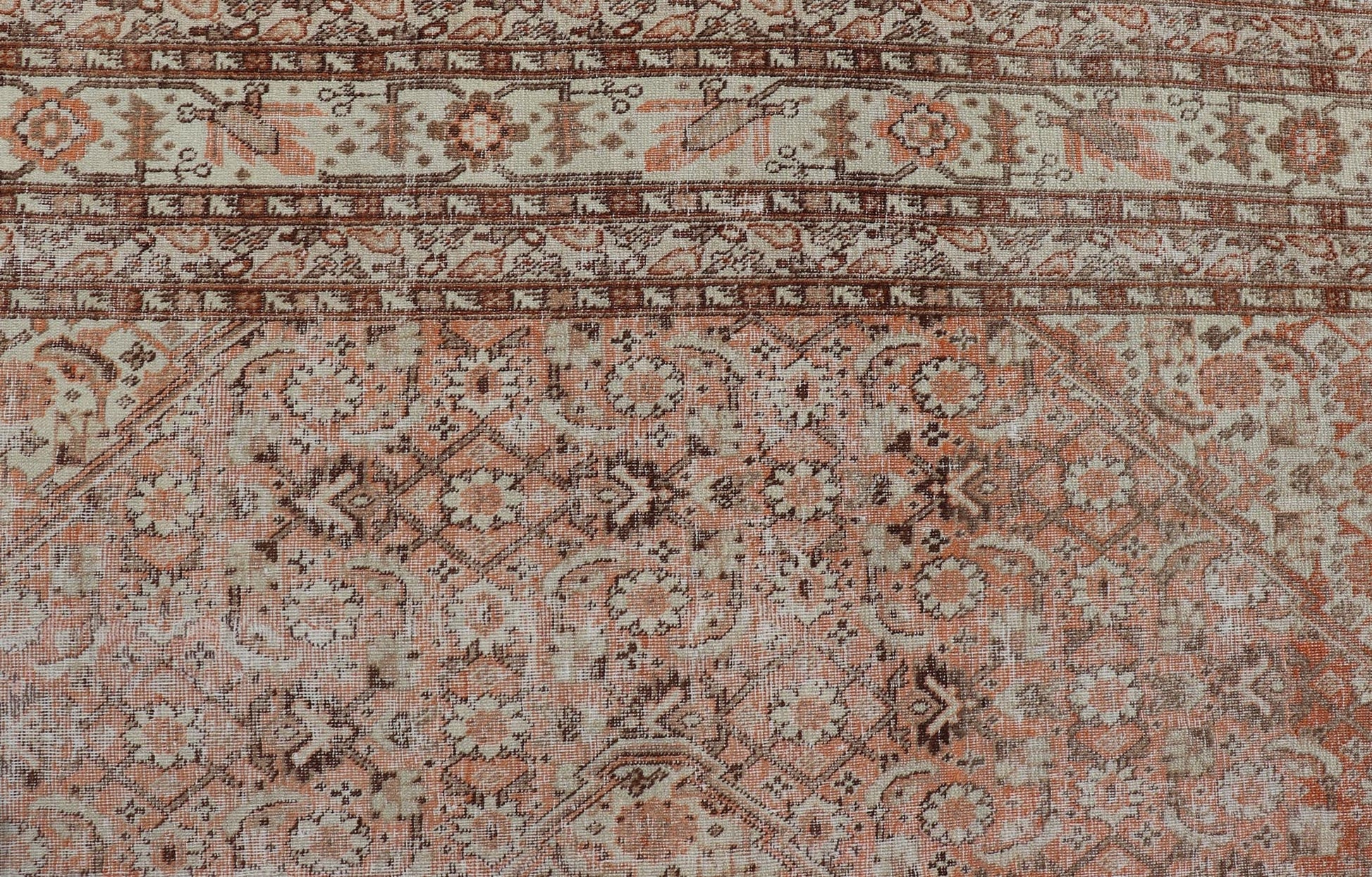 Antique Persian Tabriz with All - Over Medallion Design in Orange and Browns This antique Persian Tabriz rug features an all - over, sub - geometric floral design rendered in off white, orange and brown tones. A complementary, multi - tiered border enco... - Keivan Woven ArtsZIR - 66 - KV - 12 - 15060