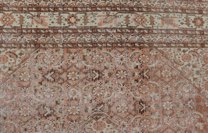 Antique Persian Tabriz with All - Over Medallion Design in Orange and Browns This antique Persian Tabriz rug features an all - over, sub - geometric floral design rendered in off white, orange and brown tones. A complementary, multi - tiered border enco... - Keivan Woven ArtsZIR - 66 - KV - 12 - 15060