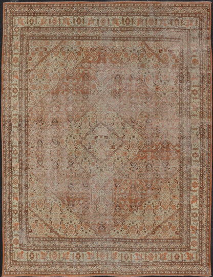 Antique Persian Tabriz with All - Over Medallion Design in Orange and Browns This antique Persian Tabriz rug features an all - over, sub - geometric floral design rendered in off white, orange and brown tones. A complementary, multi - tiered border enco... - Keivan Woven ArtsZIR - 66 - KV - 12 - 15060