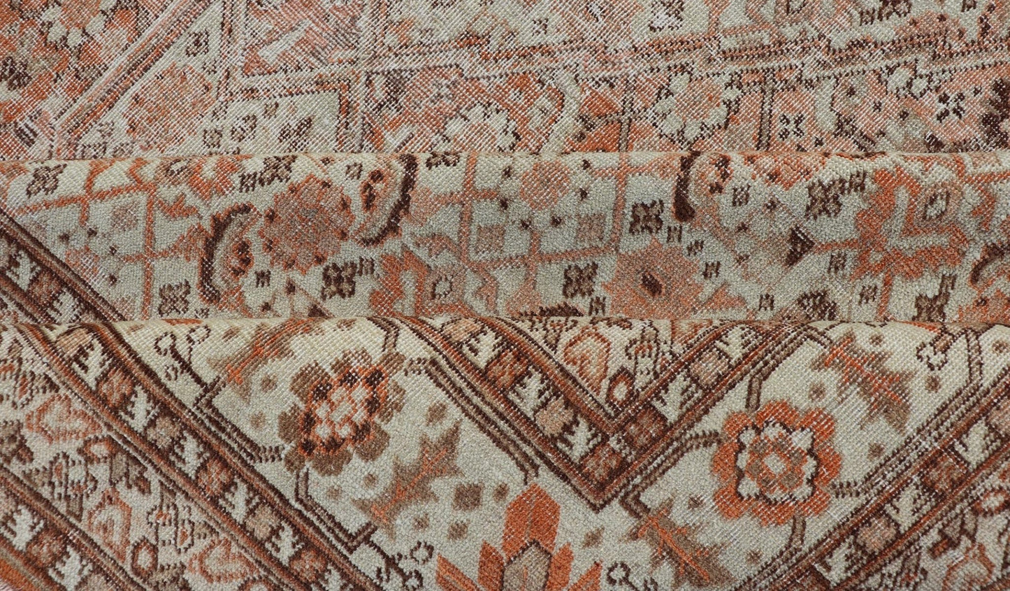 Antique Persian Tabriz with All - Over Medallion Design in Orange and Browns This antique Persian Tabriz rug features an all - over, sub - geometric floral design rendered in off white, orange and brown tones. A complementary, multi - tiered border enco... - Keivan Woven ArtsZIR - 66 - KV - 12 - 15060