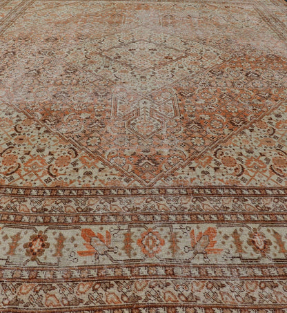 Antique Persian Tabriz with All - Over Medallion Design in Orange and Browns This antique Persian Tabriz rug features an all - over, sub - geometric floral design rendered in off white, orange and brown tones. A complementary, multi - tiered border enco... - Keivan Woven ArtsZIR - 66 - KV - 12 - 15060Rug